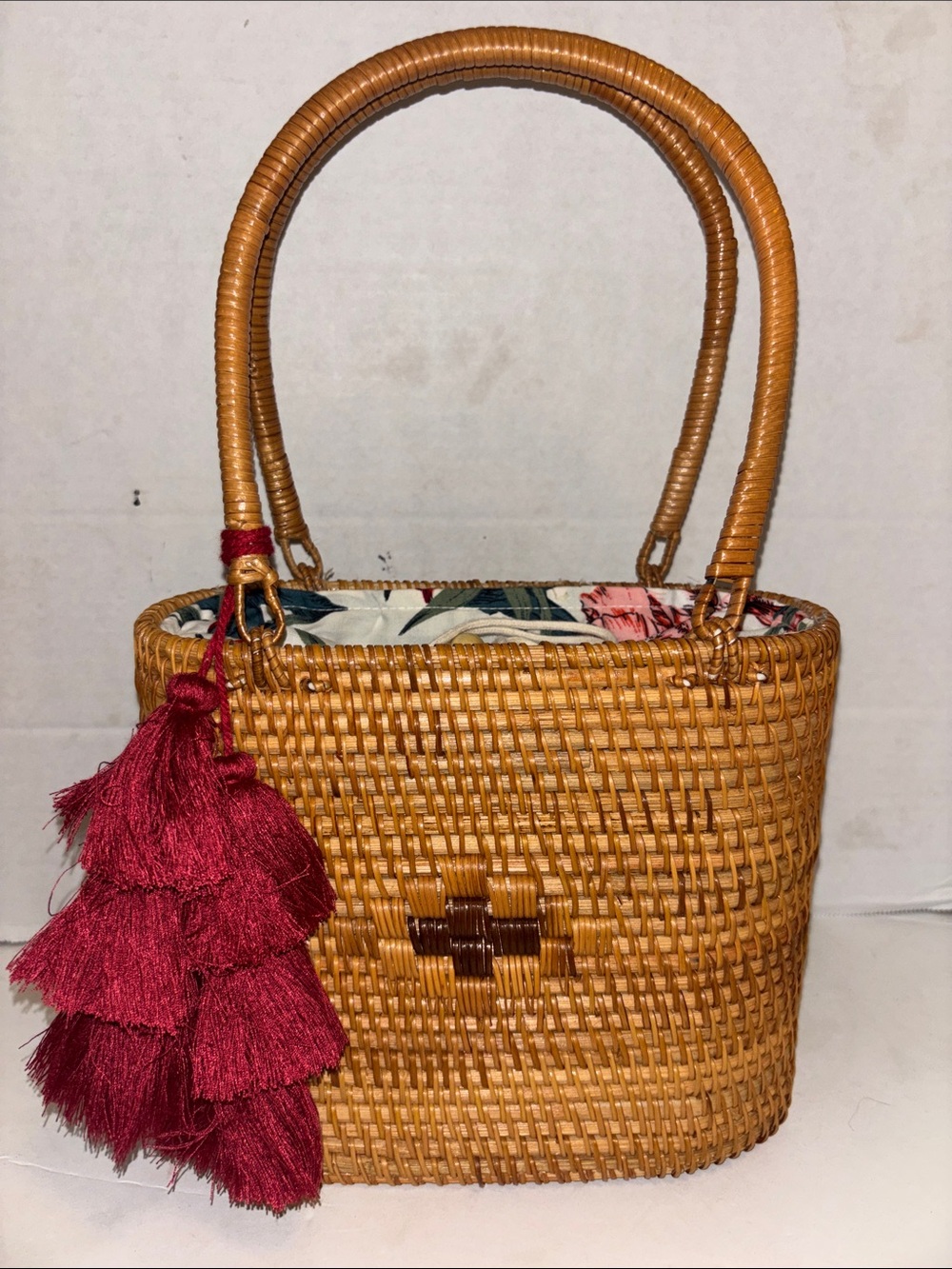 RATTAN BAG…DOUBLE HANDLES FLORAL CLOTH INTERIOR WITH DRAW STRING CLOSURE